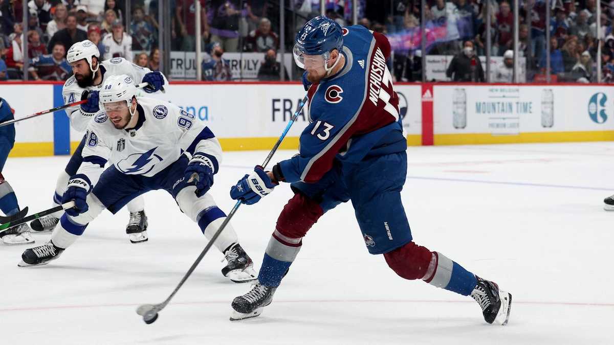 Nathan MacKinnon breaking up ice on a fast transition rush against the Lightning