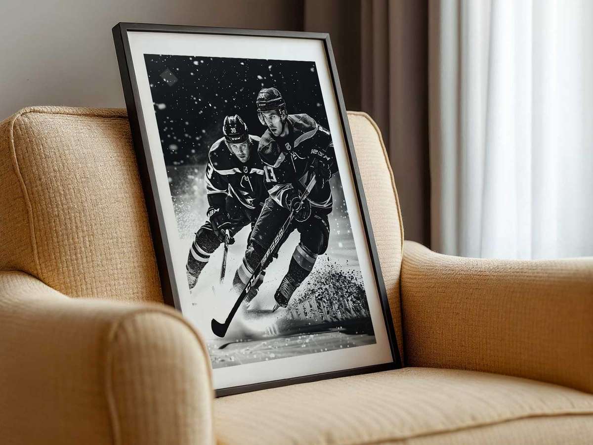 Dynamic action shot of a stick raised toward the net and goalie braced on the ice, conveying peak-game tension