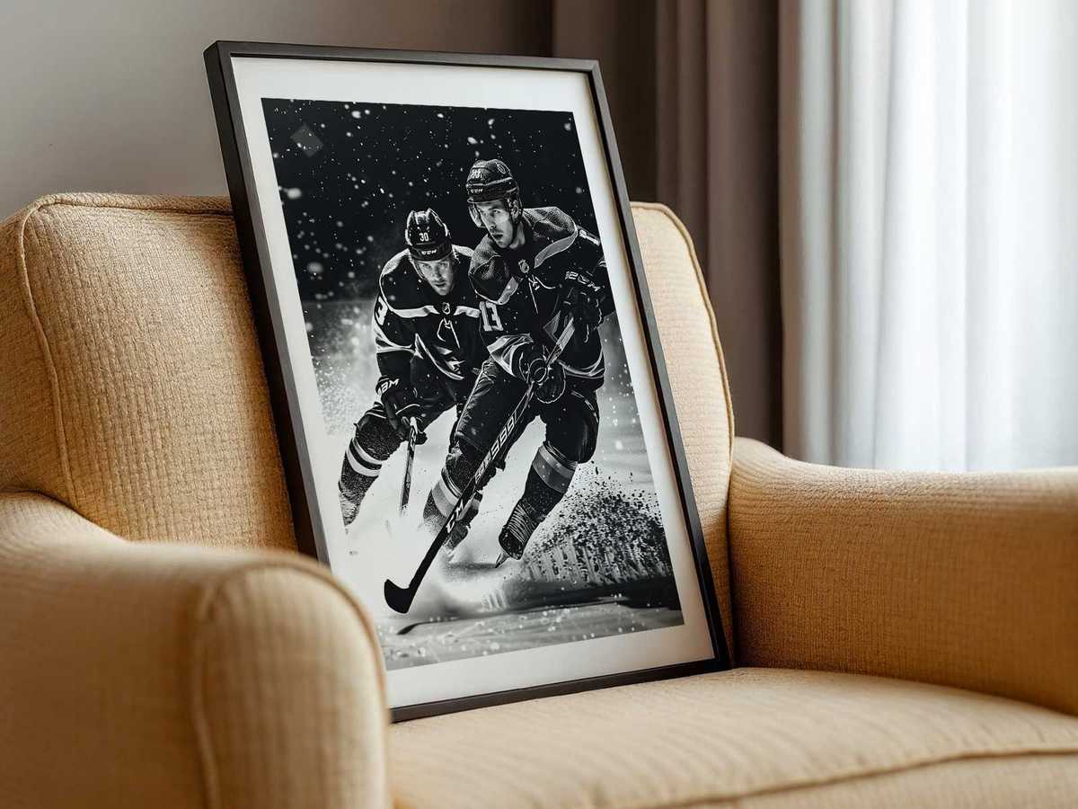Goalie diving for a dramatic save with puck in frame and visible crowd reaction