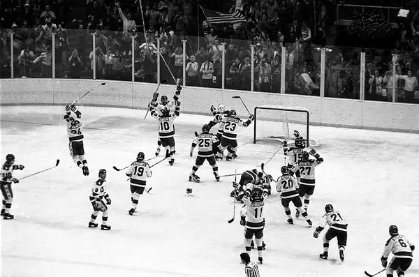 Team portrait of the 1980 United States Olympic hockey team in their white jerseys at Lake Placid