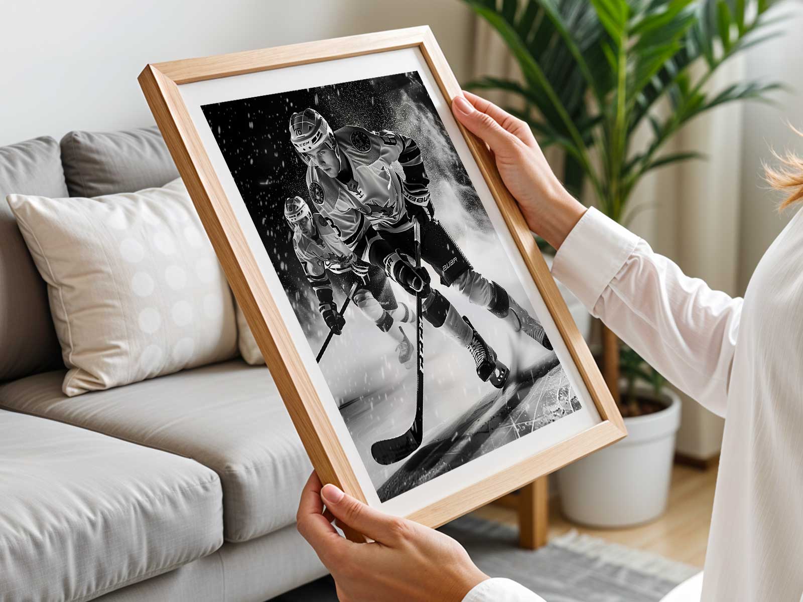 Maple Leafs defender blocking a Canucks shot in front of Joseph Woll during the shutout